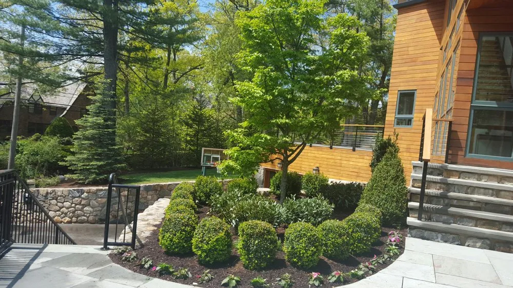 Custom outdoor landscaping for residential properties in Newton, MA by Newton Landscape