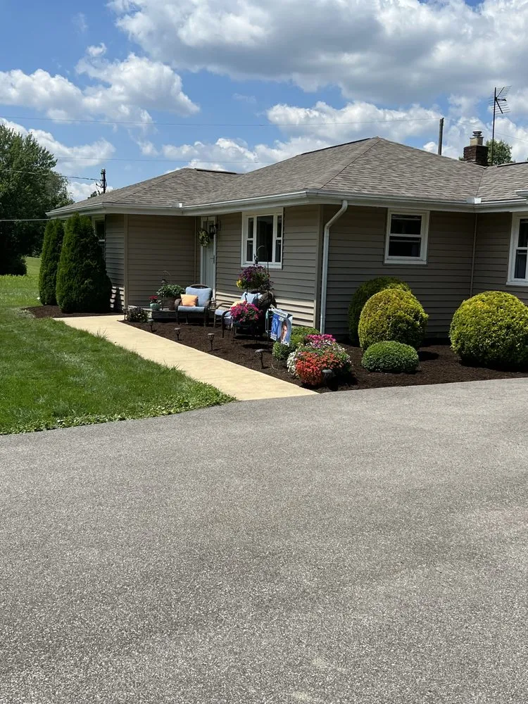 Professional lawn care service for year-round maintenance across Akron, OH - Next level