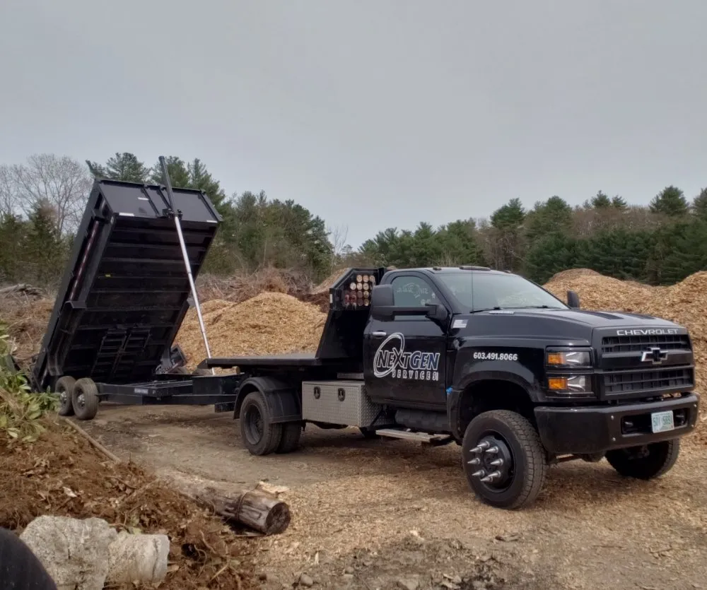 Custom landscape installation in Suncook, NH by NextGen Services