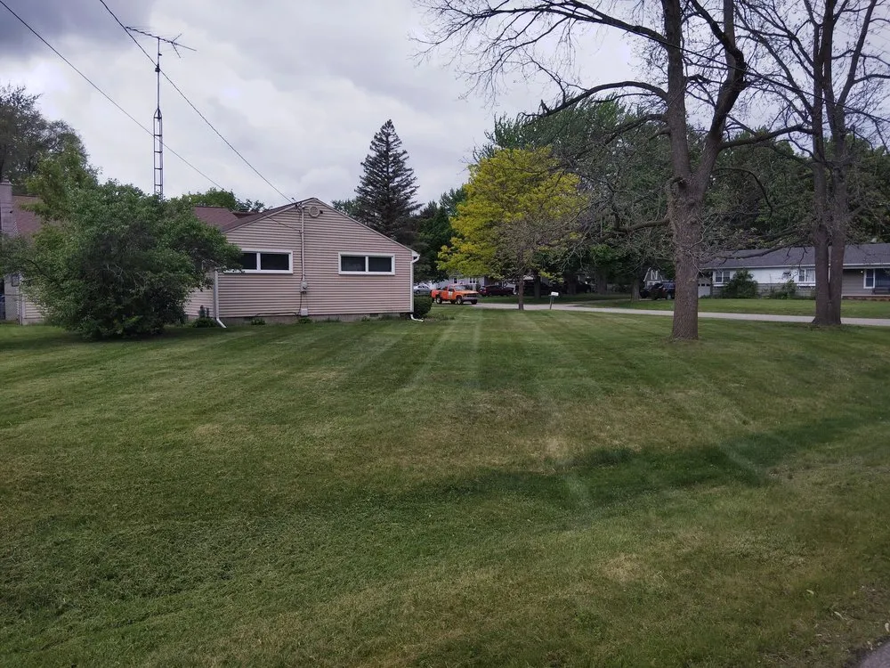 Local lawn mowing service for residential properties in Flushing, MI by Nexus Landscape & Lawncare