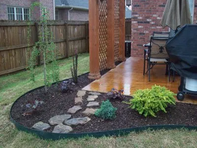 Professional landscape design for year-round maintenance in Fayetteville, AR by Nichols Reliable Lawn Care and More