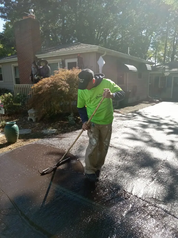 Top-rated yard cleanup service with custom design across Flint, MI - Nick and Rae Ann's Lawn Care and Specialties
