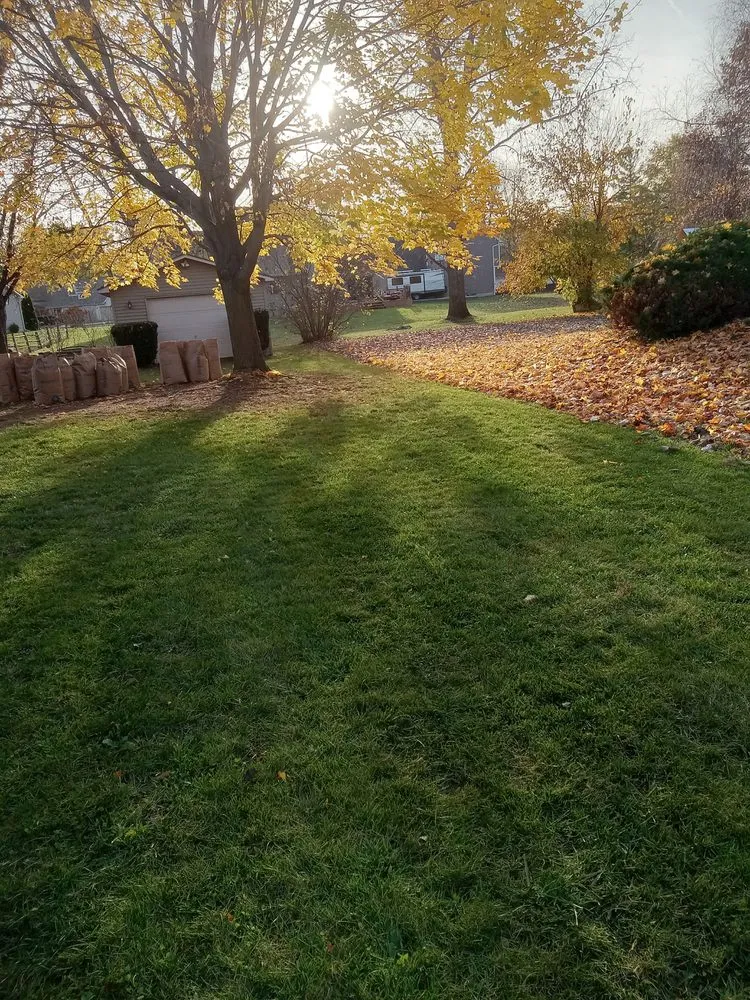 Custom garden landscaping for beautiful yards in Flint, MI by Nick and Rae Ann's Lawn Care and Specialties