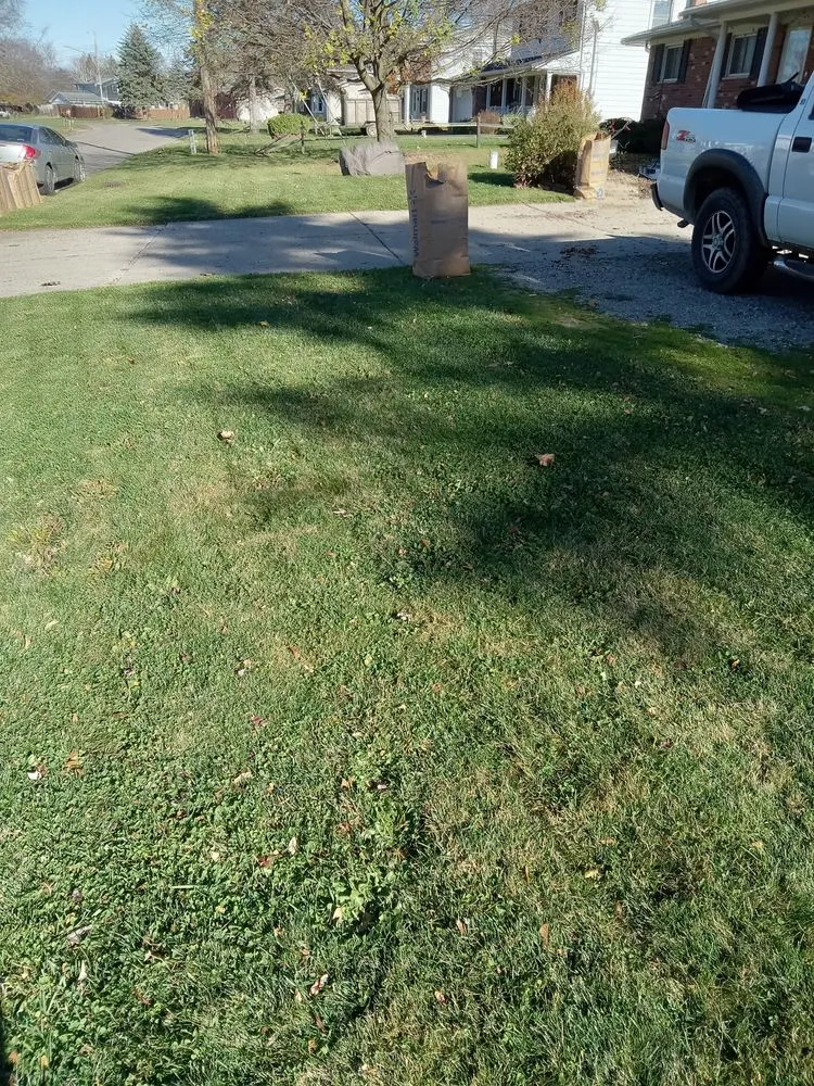 Trusted outdoor landscaping for residential properties in Flint, MI by Nick and Rae Ann's Lawn Care and Specialties