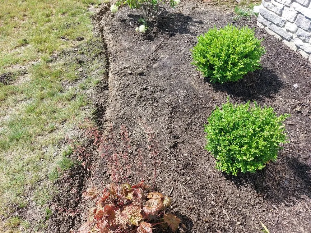 Custom landscape installation for year-round maintenance across Fort Wayne, IN - Nick’s Lawn Care