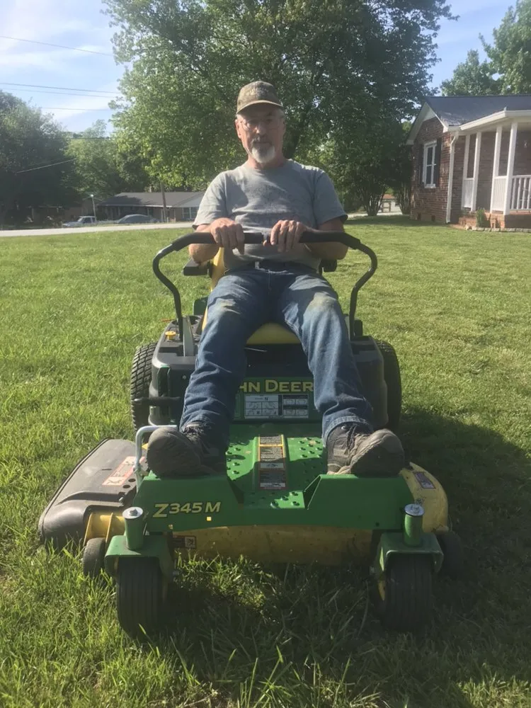 Professional yard cleanup service for year-round maintenance in Simpsonville, SC by Nick's Lawn mowing & Stump Grinding