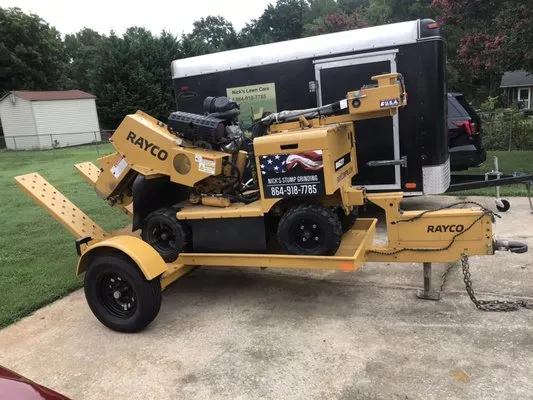 Nick's Lawn mowing & Stump Grinding Logo