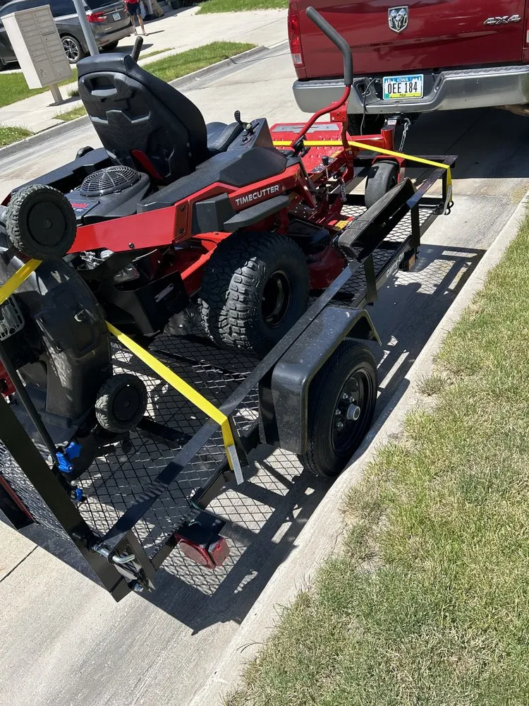 Expert lawn mowing service with custom design across Clive, IA - Nick’s Lawncare and Landscaping