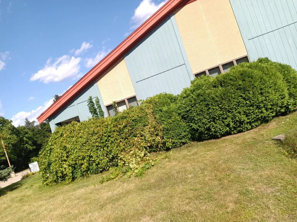 Expert lawn mowing service for year-round maintenance across Flint, MI - Nick's Outdoor services