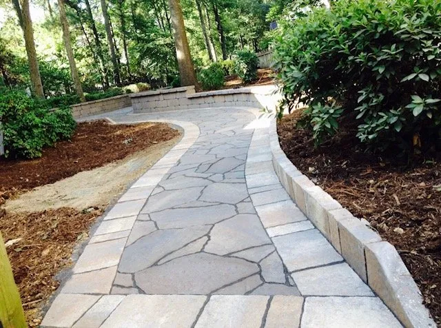 Custom outdoor landscaping for residential properties in Raleigh, NC by Nicolas Hardscape and Drainage