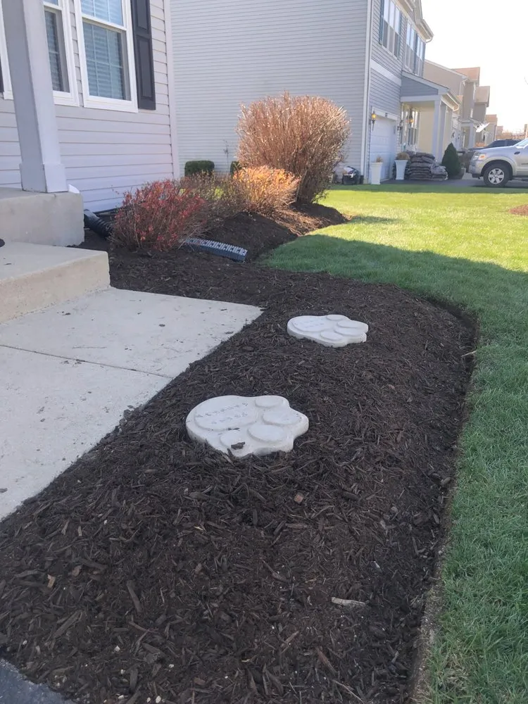 Custom landscaping services for year-round maintenance across Belvidere, IL - Nico's Landscaping