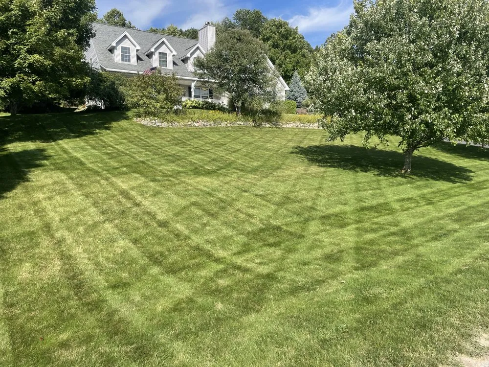 Local garden landscaping with custom design in Williamsburg, MI by Nienhouse Outdoors