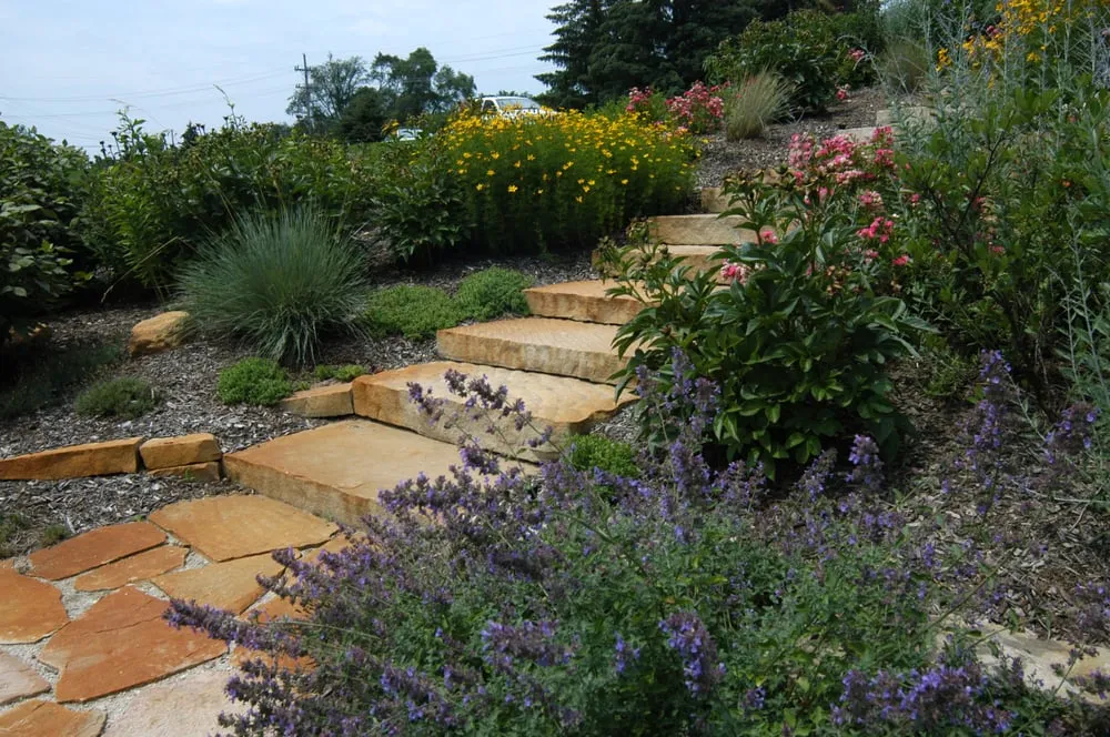 Trusted lawn mowing service for residential properties in Woodstock, IL by Nierman Landscape & Design