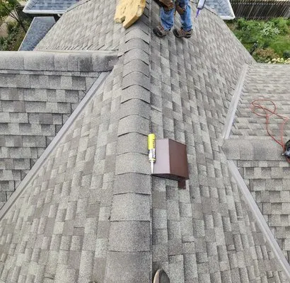 Nikitas Roofing And Landscaping Logo