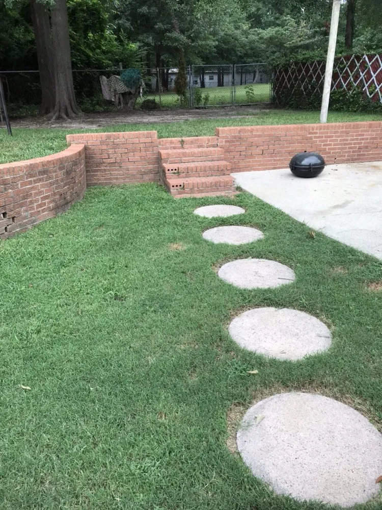 Professional landscape design for year-round maintenance in El Dorado, AR by Nine to Five Lawn Care