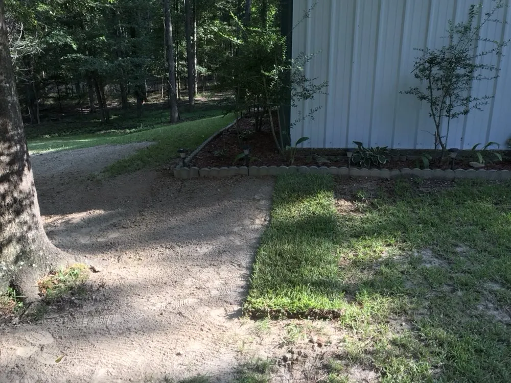 Custom residential landscaping in El Dorado, AR by Nine to Five Lawn Care