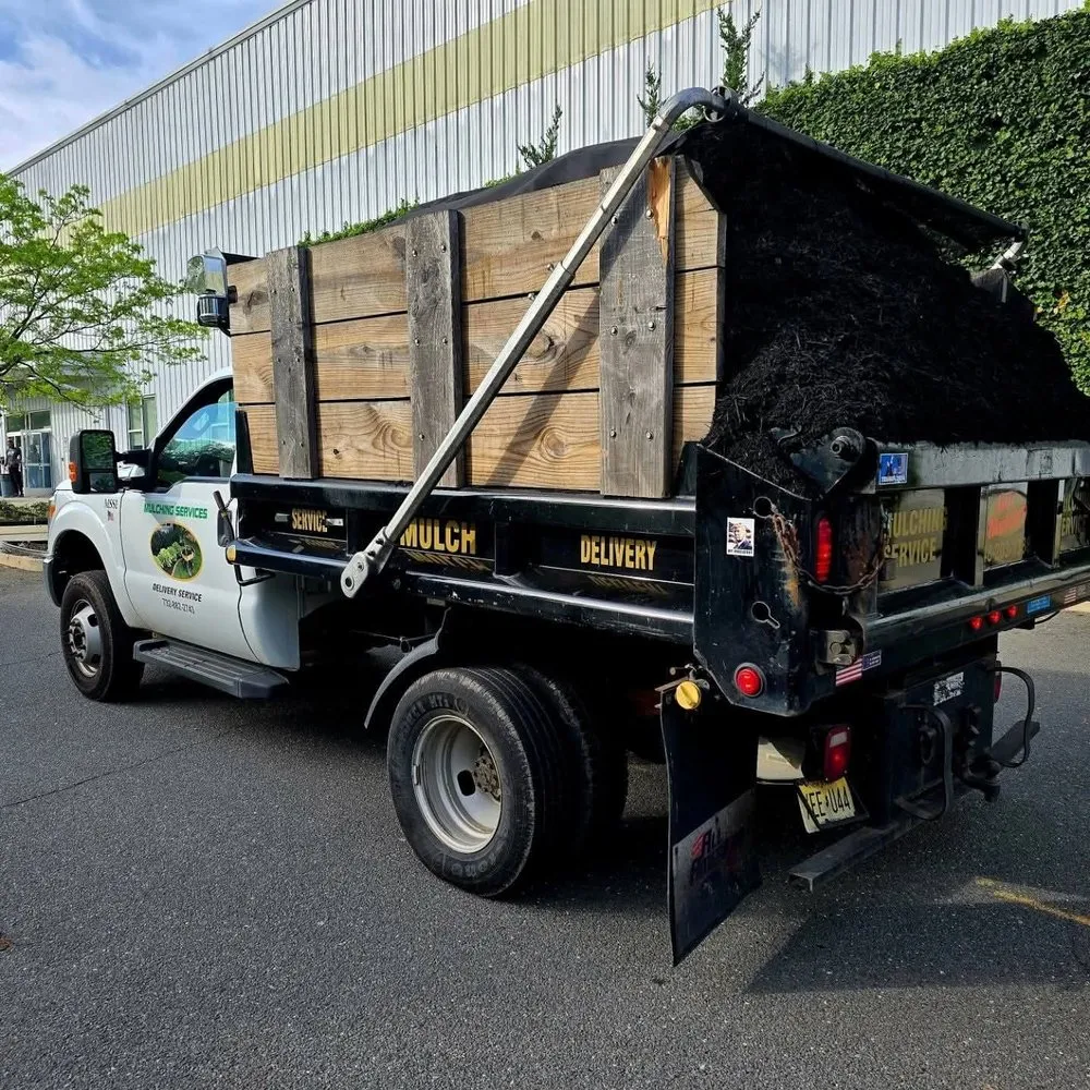 Custom lawn mowing service for year-round maintenance in Scotch Plains, NJ by NJ Mulching Services , Sales & Installations