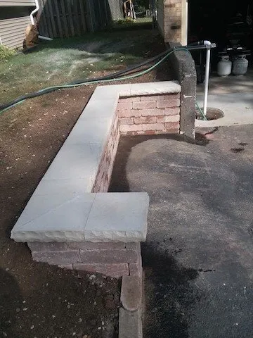 Custom yard cleanup service with custom design in Harvard, IL by NJE Tree Service & Landscaping