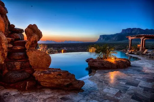 Affordable landscape installation with custom design across Mesa, AZ - No Limit Pools & Spas