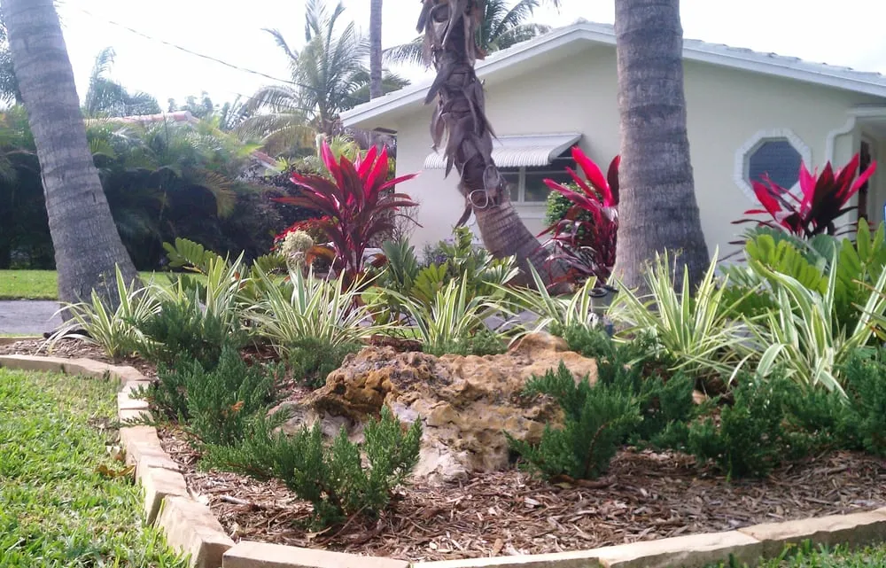 Custom landscape design for beautiful yards in Pompano Beach, FL by No Worries Property Maintenance