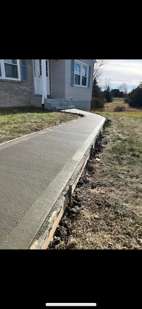 Trusted lawn mowing service for outdoor upgrades in Osage Beach, MO by Nolan Concrete