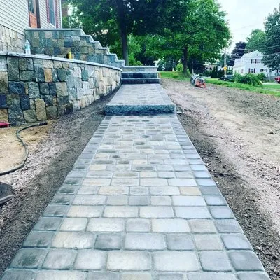 Nolasco Lanscaping & Construction Logo