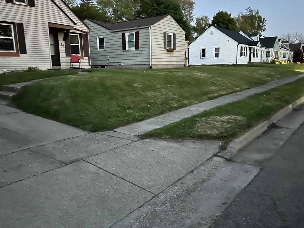 Expert lawn mowing service in Springfield, MI by Norman & Son