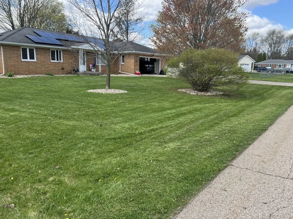 Professional lawn mowing service with custom design across Springfield, MI - Norman & Son