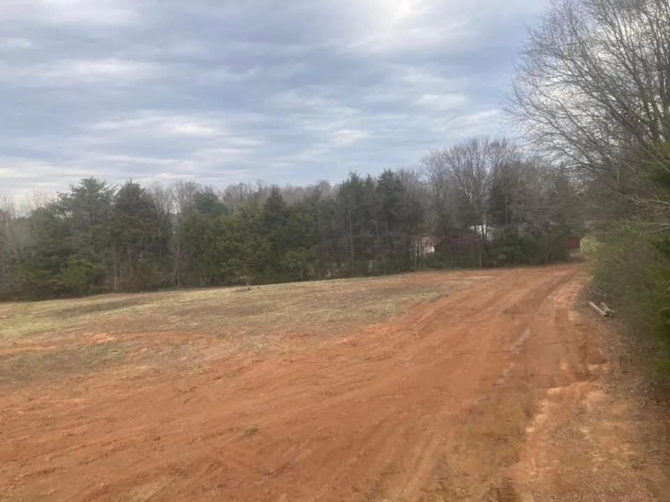 Local landscape design with custom design in Alexis, NC by Norris Grading & Landscaping