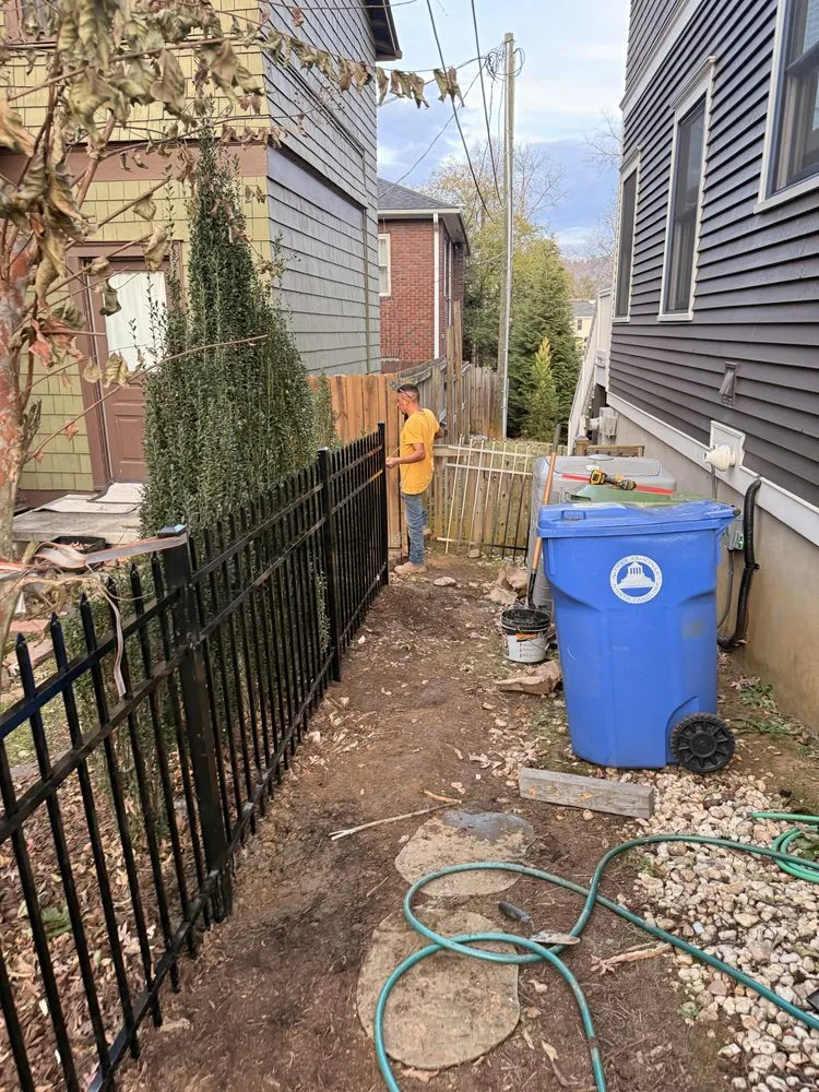 Expert yard cleanup service for homes in Asheville, NC by Norstar Fence Company
