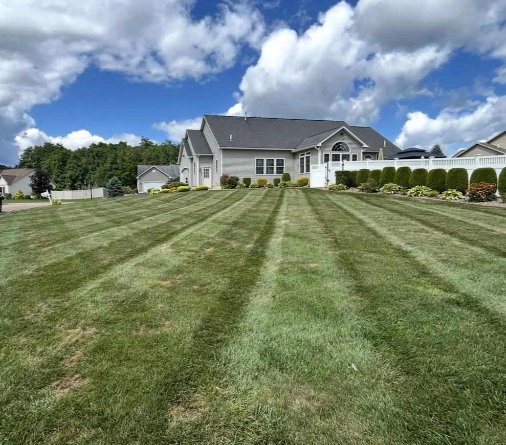 Expert outdoor landscaping in West Monroe, NY by North Country Lawn and Snow