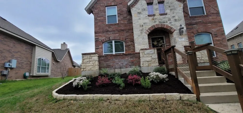 Professional outdoor landscaping with custom design in Hutto, TX by North Lake Contractors