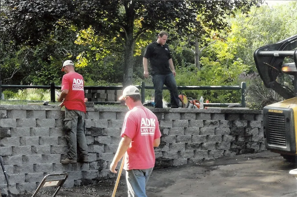 Affordable lawn mowing service for year-round maintenance in Derry, NH by North Point Outdoors