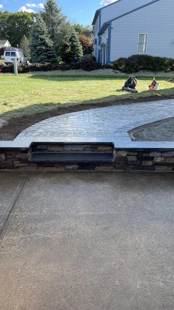 Expert lawn mowing service for homes in Providence, RI by North United Landscaping and Masonry