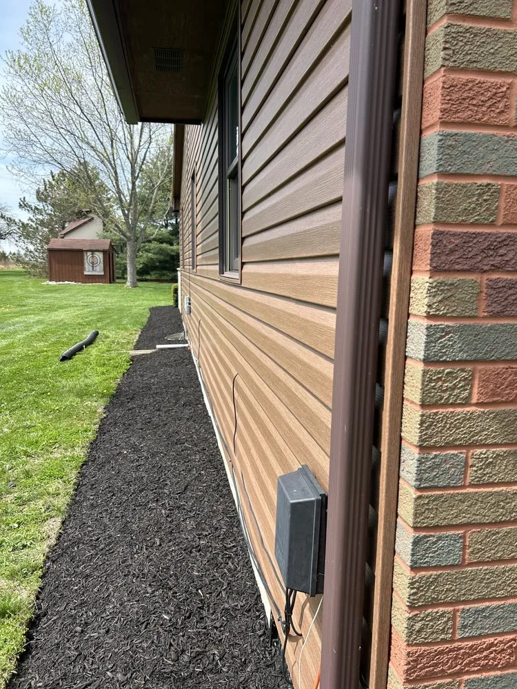 Expert landscape design for outdoor upgrades in Tiffin, OH by North West Ohio Lawn And Landscape