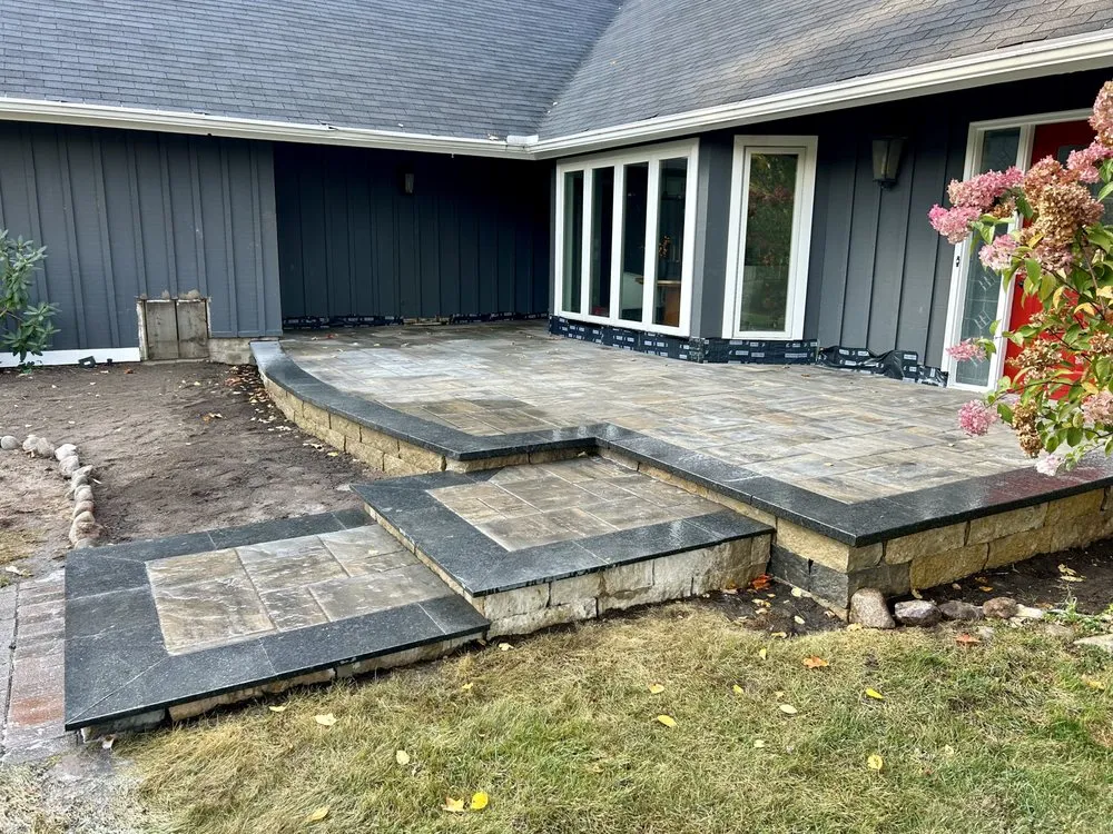 Local landscape installation with custom design in Harbor Springs, MI by North Wind Property Management