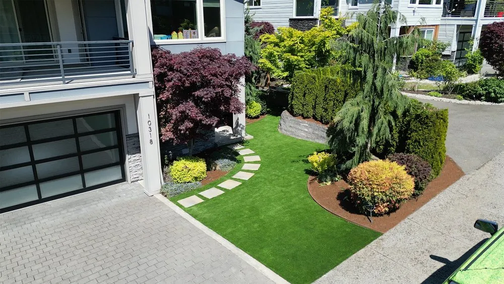 Local lawn mowing service with custom design in Renton, WA by Northeast Landscaping Service