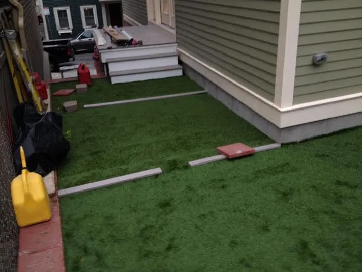 Trusted yard cleanup service for homes in Clinton, MA by Northeast Synthetic Turf Company