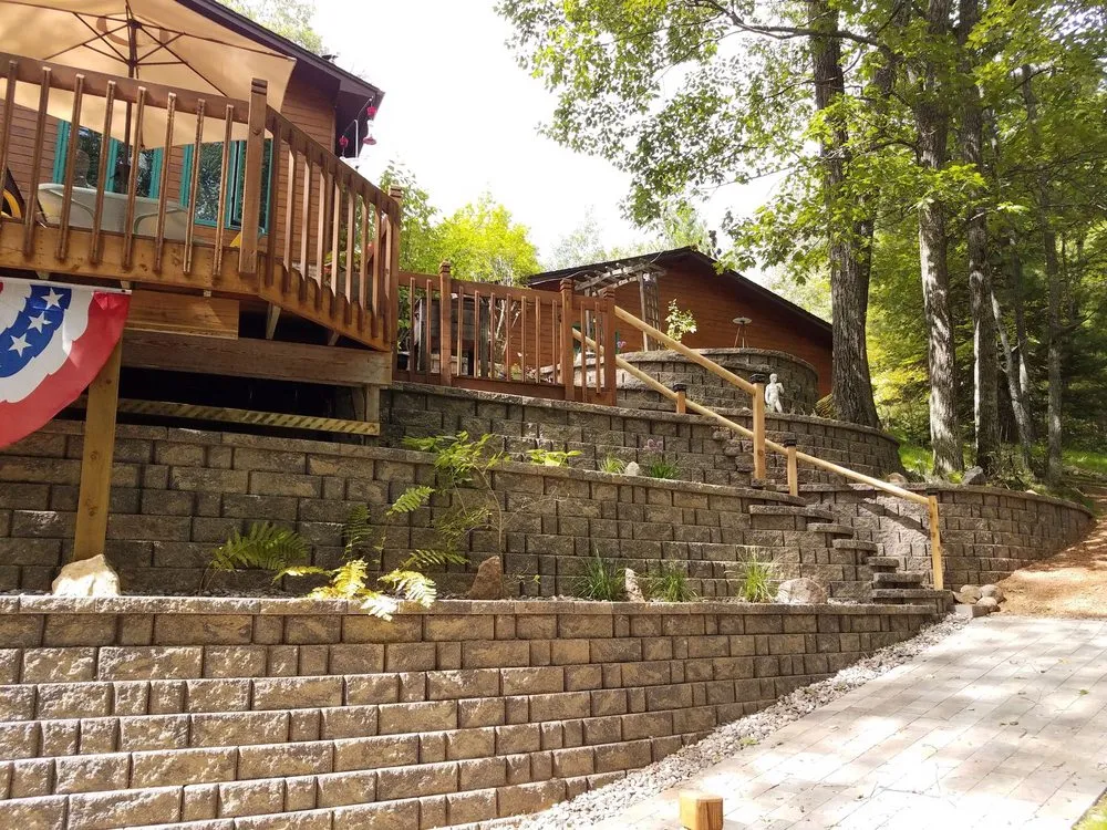 Custom landscape installation for outdoor upgrades in Eagle River, WI by Northern Lakes Landscaping