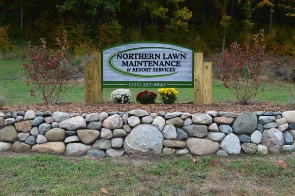 Northern Lawn Maintenance & Resort Services Logo