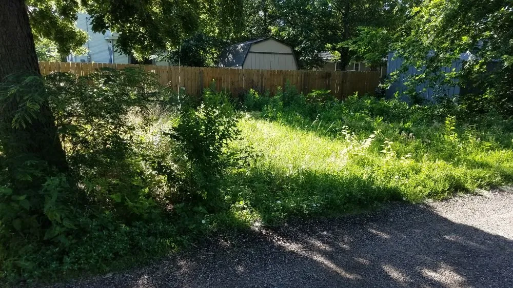 Custom lawn mowing service in McPherson, KS by Not Too Shabby Lawn Care