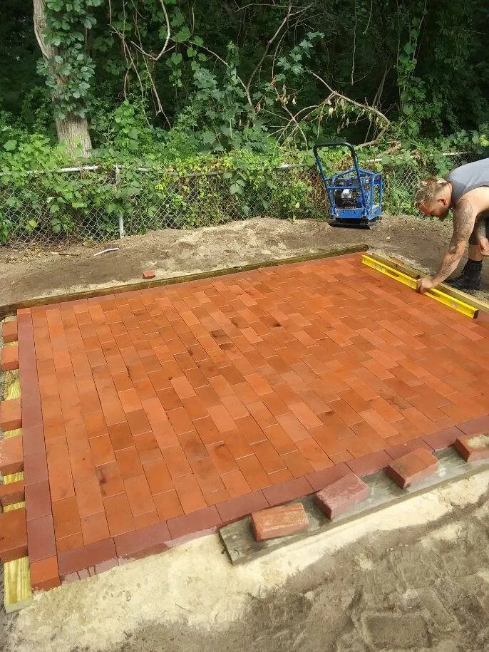 Local lawn mowing service with custom design across Plainville, MA - Not Your Average Dads Lawn and Landscaping Services