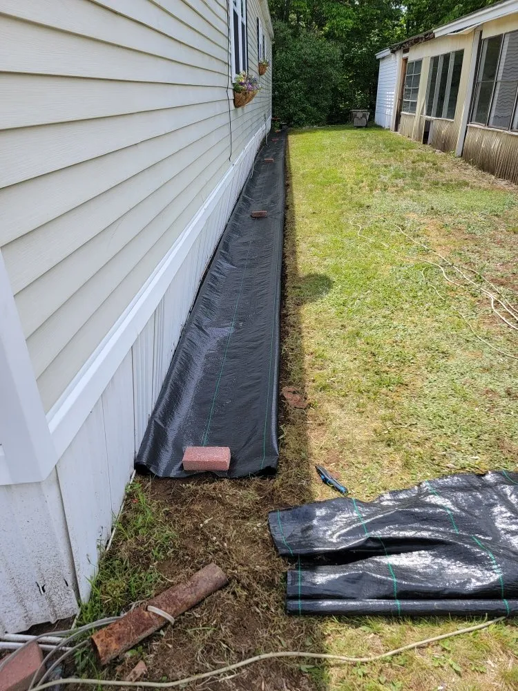 Custom landscape design for outdoor upgrades in Gorham, NH by Novellino Carpentry & Maintenance