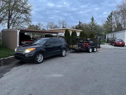 Nutlouis & Son’s Services Logo