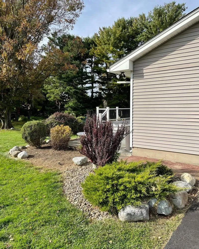 Custom outdoor landscaping with custom design across Milford, NJ - Nxtl maintenance