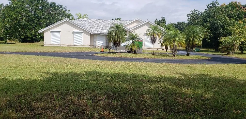 Custom yard cleanup service for year-round maintenance in Princeton, FL by Nyce Lawn Services