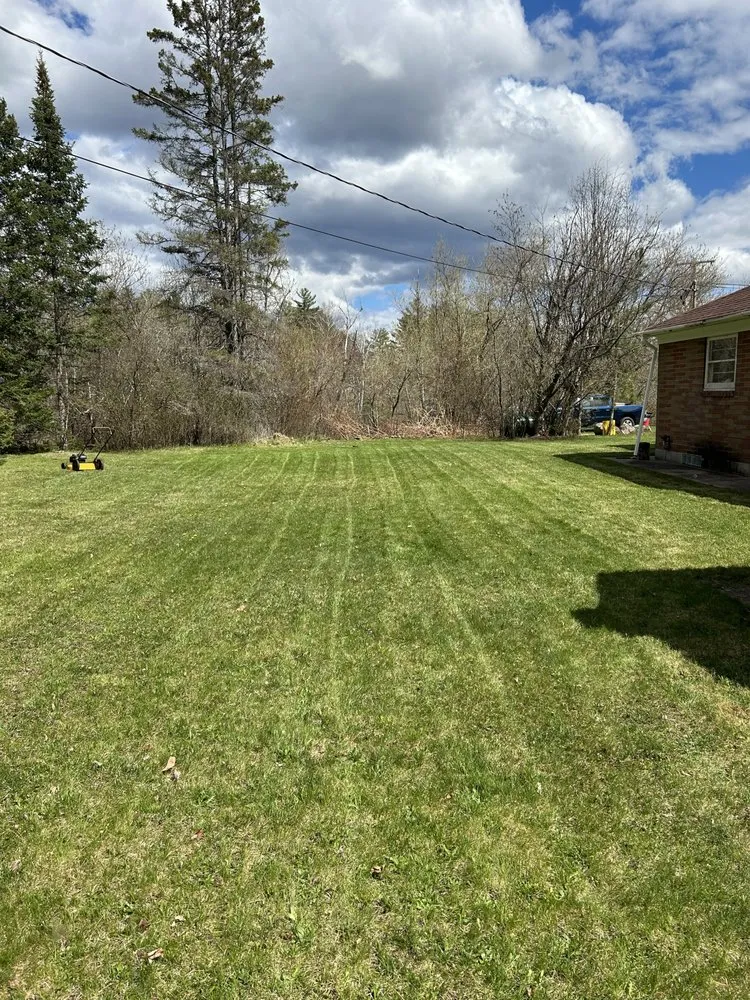 Custom lawn care service with custom design in Ishpeming, MI by Nylander Lawn Care