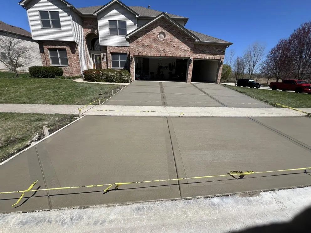 Custom landscape installation for beautiful yards in Warrenville, IL by O & C Concrete & Lanscaping