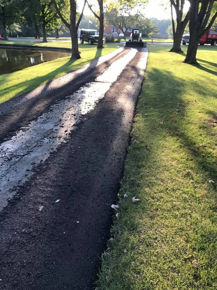 Custom yard cleanup service for outdoor upgrades in Buckner, MO by O & M Concrete and Asphalt