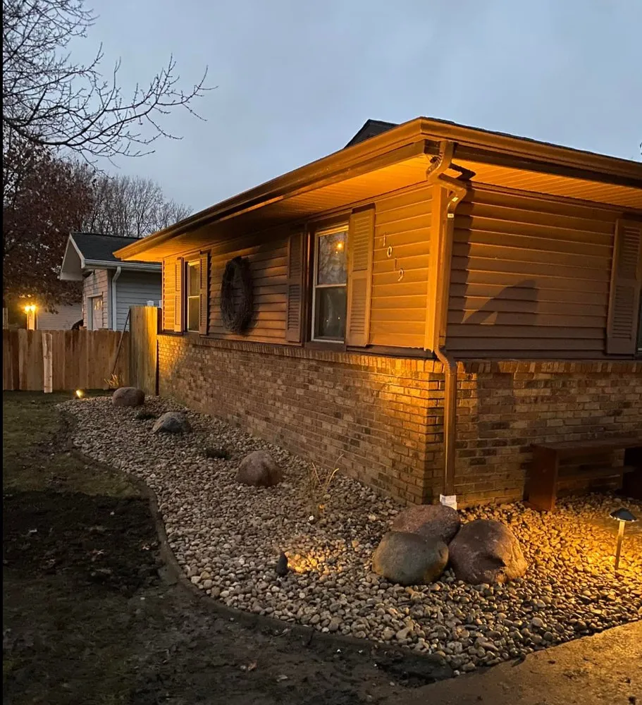 Custom garden landscaping with custom design in Saint Joseph, IL by Oak Creek Outdoor Services